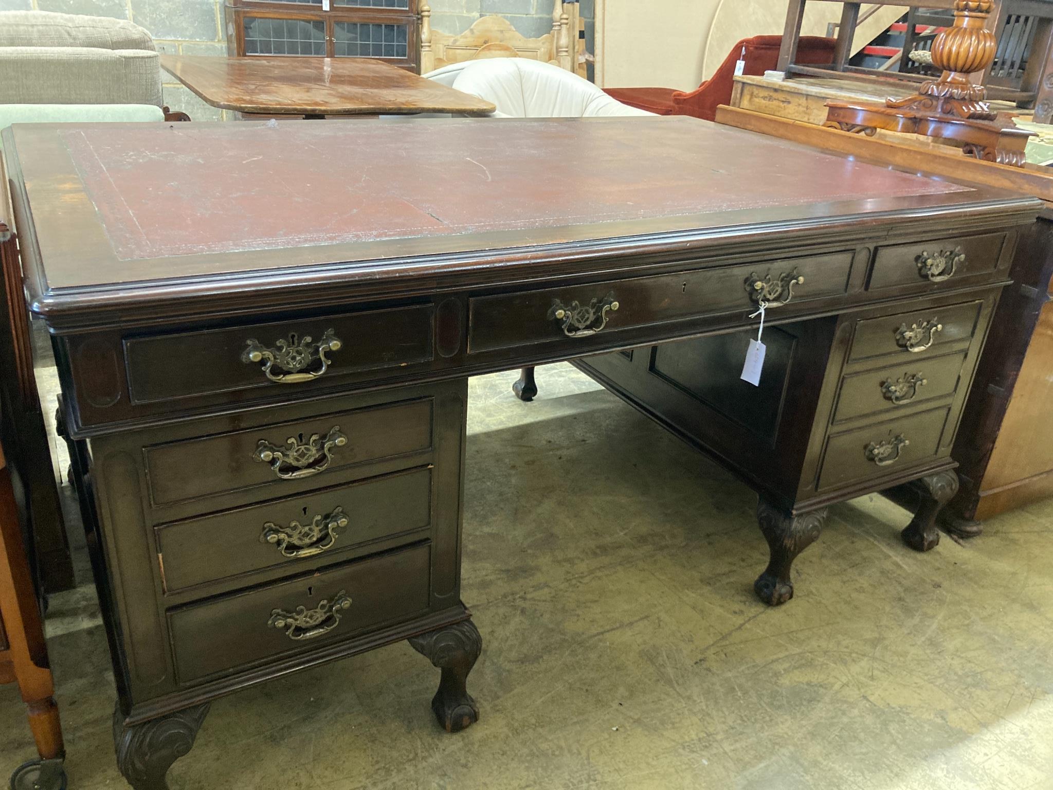 A 1920's Chippendale revival mahogany pedestal desk, length 166cm, depth 106cm, height 80cm